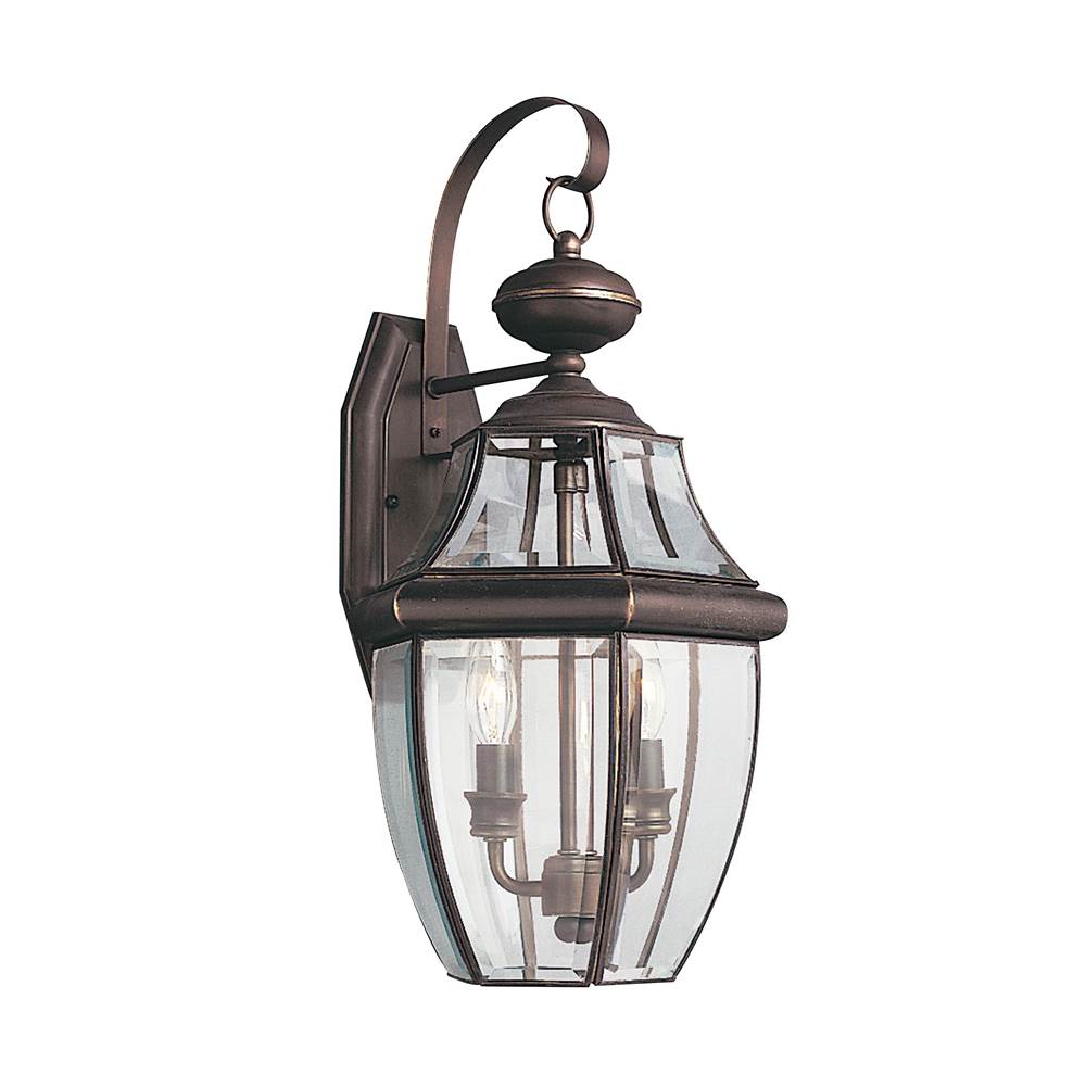 Generation Lighting Lancaster Traditional 2-Light Outdoor Exterior Wall Lantern Sconce In Antique Bronze Finish With Clear Curved Beveled Glass Shade